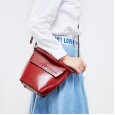 Summer new niche design female bag cowhide bucket bag leather vertical casual shoulder bag