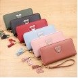 Wallet ladies long zipper wallet new Japanese and Korean fashion large capacity heart-shaped tassel phone clutch