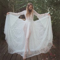 Spring and summer new transparent lace trumpet long-sleeved V-neck big swing sexy dress